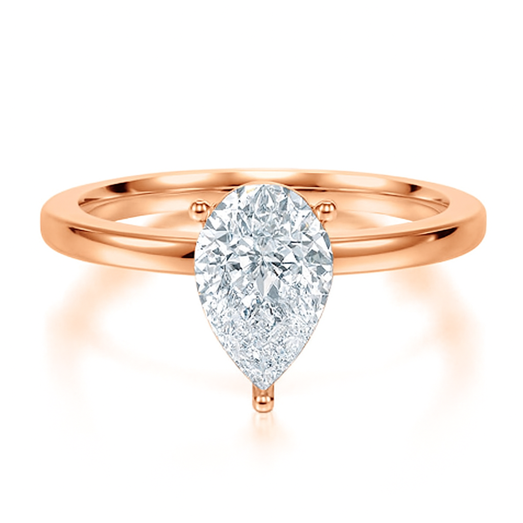 Pear Cut Solitaire with a Raised Setting on a Solid Shank