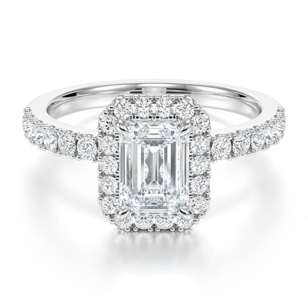 Emerald Cut with Halo with a Hidden Diamond Setting and Solid Shoulder Diamond Band
