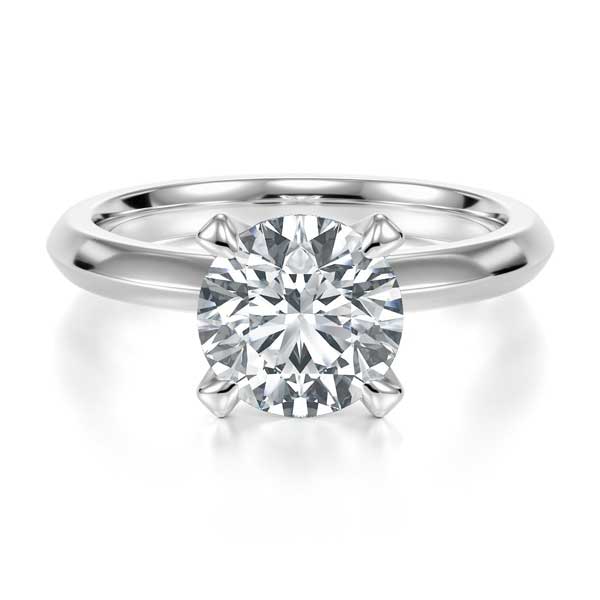 4 Open Claw Round Brilliant Cut Solitaire with a Solid Knife Edge Band