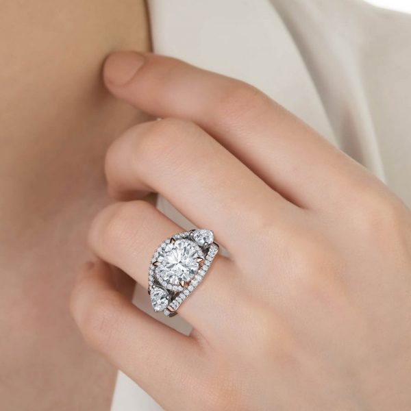 Round Brilliant Cut and Pear Shape Trilogy with Shoulder Diamonds